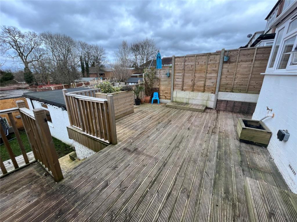 Raised timber deck and rear garden before landscaping works