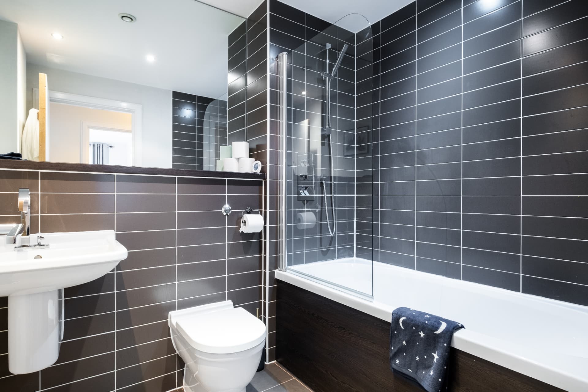 Completed guest bathroom with shower screen and fittings