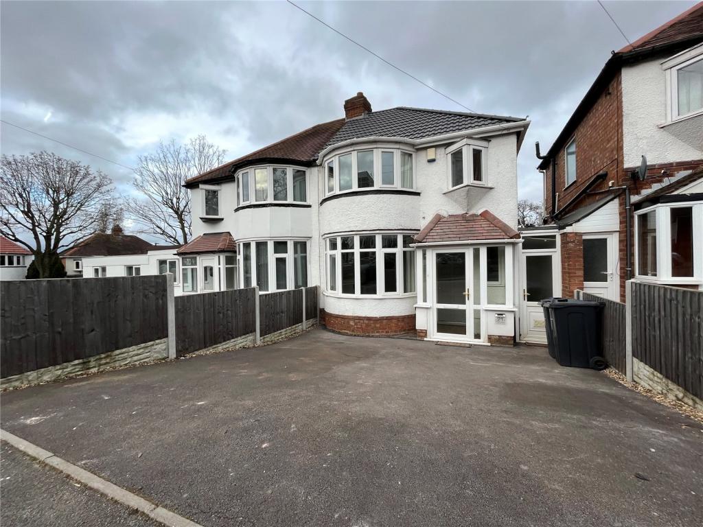 Completed white rendered semi-detached property with resurfaced driveway